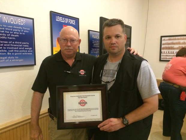 Tom Givens presenting me with the Top Gun award.