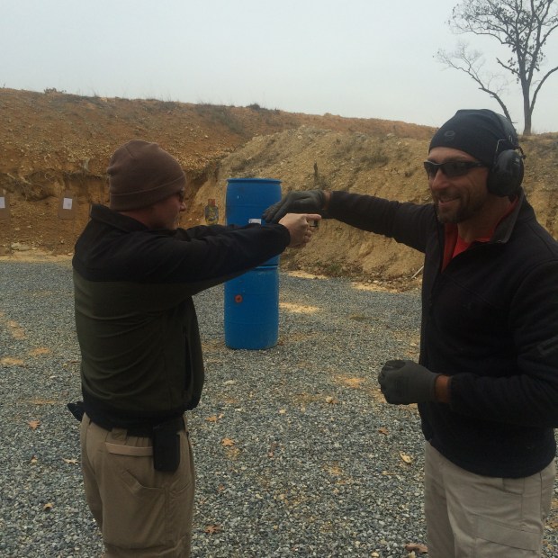 Frank explaining property grip with Corporal Sparrow